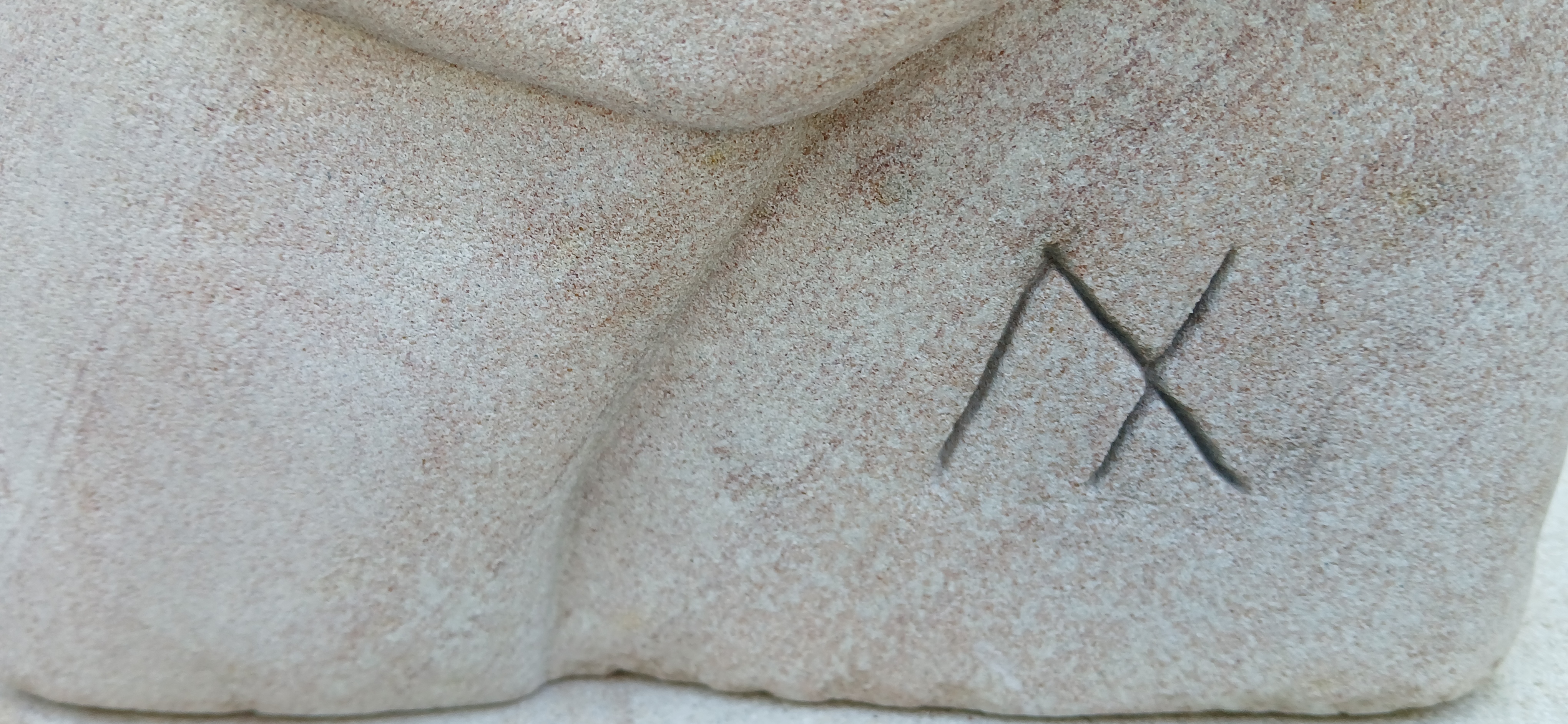 Carved signature in stone